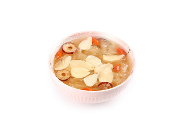 Asian Clear Soup with Lily Bulb, Mushrooms and Goji Berries in White Bowl