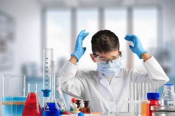 Little child make chemistry science experimental chemistry lessons.