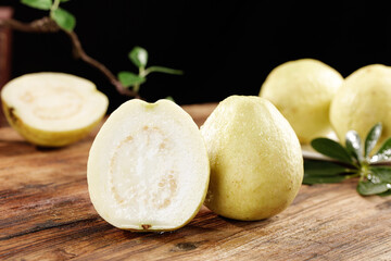 Fresh White Guava Fruit Sliced Half Showing Cream Flesh Seeds Wooden Board Natural Light Soft Photography
