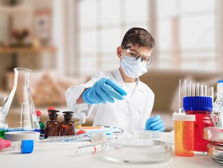 Little child make chemistry science experimental chemistry lessons.