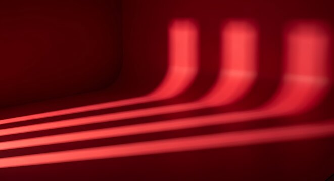 Abstract background with parallel red light stripes creating a sense of depth and movement in a minimalist, modern design with a dark, moody ambiance