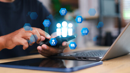 CRM Concept. Customer relationship management, business network structure, and businessman touch person icon on the virtual screen Represent the marketing strategy of organization business.