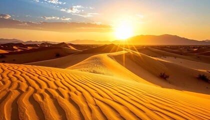 Golden sunset over desert dunes
