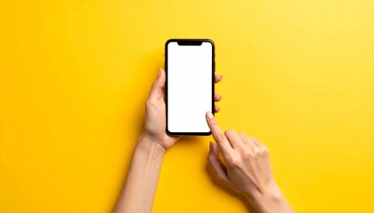 Smartphone in hands on a bright yellow background