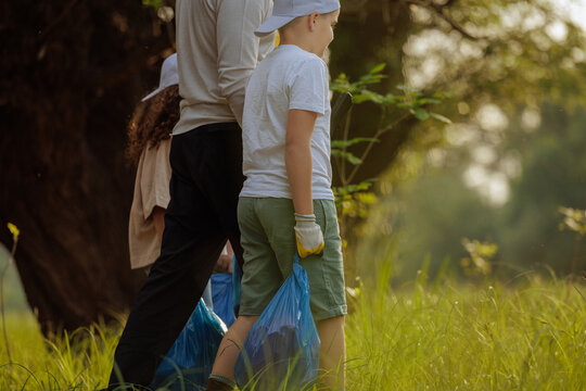 Volunteers collecting garbage in a public park