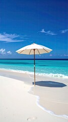 Pristine white sand beach with a white umbrella