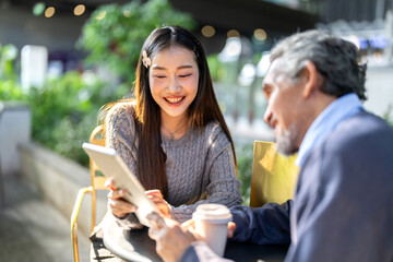 Father and daughter relationship, family bonding moment, happy asian dad and daughter using tablet together outdoors sharing love, connection and joyful interaction in modern digital family lifestyle