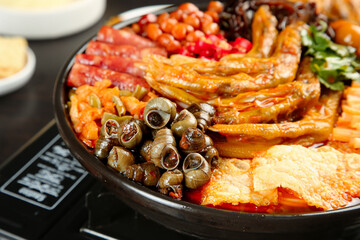 Liuzhou Specialty Hot Pot Casserole with Duck Feet and Whelk Snails Traditional Chinese Cuisine