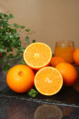 Fresh Navel Oranges with Juice Glass - Premium Quality Citrus Fruit Still Life
