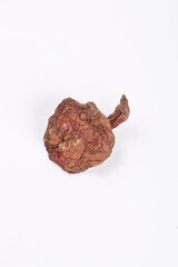 Dried Red Porcini Mushroom Isolated on White Background - Nutritious Cooking Ingredient