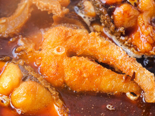 Traditional Smoked Fish Specialty in Rich Sauce - Asian Cuisine Delicacy