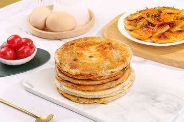 Shanghai Scallion Pancakes Stack with Traditional Chinese Food Ingredients