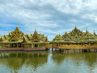 The stunning golden pavilion on the water or Pavilion of the Enlightened at the Ancient City...