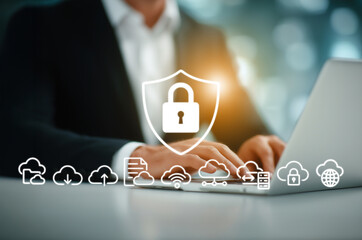 Businessman using laptop with cybersecurity icons overlay, representing cloud data protection, secure access, privacy, and encrypted network connection in modern digital workplace. generative ai