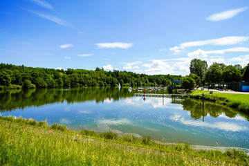Fototapeta premium View of the Bucher Reservoir and the surrounding landscape. Nature near Rainau. 
