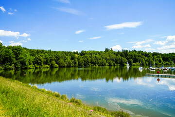 View of the Bucher Reservoir and the surrounding landscape. Nature near Rainau.