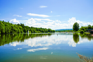 View of the Bucher Reservoir and the surrounding landscape. Nature near Rainau.

