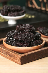 Dried Black Jujube Dates from Shaanxi Province China in Wooden Bowl