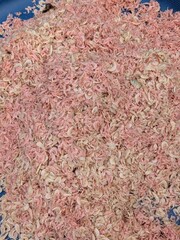 A large pile of pink and white shrimp paste.