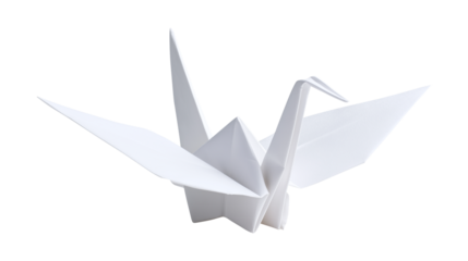 White origami crane paper bird isolated on dark background