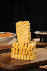 Dried Tofu Sticks Stack on Wooden Board - Asian Protein Food Ingredient Studio Shot