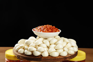 Fresh Garlic Cloves with Homemade Tomato Sauce for Downhome Cooking and Seasoning