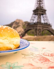 Sweet treat beside a replica of the Eiffel Tower