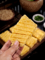 Grilled Tofu Skewer on Wooden Stick - Traditional Asian Street Food Preparation