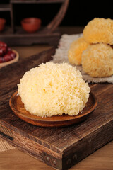 White Silver Ear Fungus Tremella on Wooden Plate Traditional Chinese Medicine Ingredient