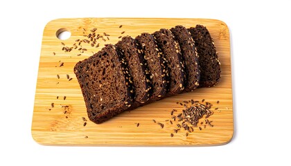Sliced dark bread on cutting board