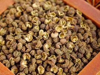 Dried Sichuan Peppercorns Spice in Wooden Bowl - Asian Cooking Ingredients