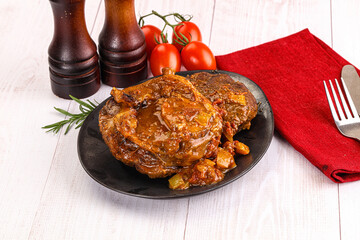 Italian cuisine - ossobuco with sauce