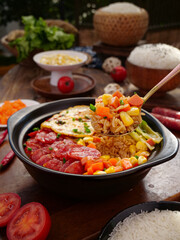 Aromatic Rice with Salami and Vegetables - Traditional One-Pan Meal with Fresh Ingredients