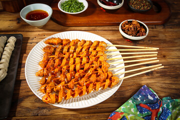 Spicy Grilled Gluten Skewers - Traditional Shaanxi Chinese Street Food Specialties Closeup