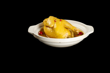 Traditional Chinese Chicken Soup with Red Dates in White Bowl Black Background