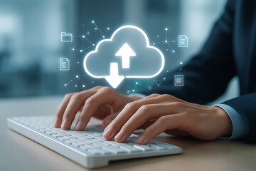 Businessman Transferring Files to Cloud Computing System on a Desktop Computer