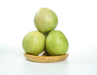 Fresh Green Guava Fruits from Guangxi Province on Wooden Plate - Tropical Fruit Still Life