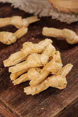 Dried Bean Curd Sticks Yuba on Wooden Board Traditional Asian Food Ingredient