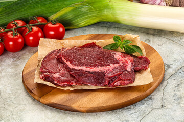 Raw beef cheeks cut for cooking
