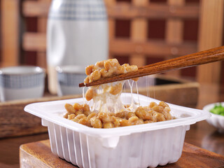 Japanese Natto Fermented Soybeans with Chopsticks - Traditional Healthy Breakfast Food