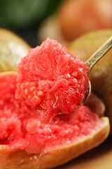 Fresh Red Guava Fruit Flesh on Spoon - Tropical Exotic Fruit Close-up