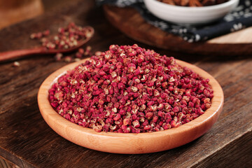 Premium Sichuan Dahongpao Peppercorns Hanyuan Red Granules in Wooden Bowl Chinese Spice Cooking Ingredient