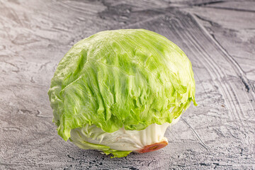 Obraz premium Raw iceberg salat over background