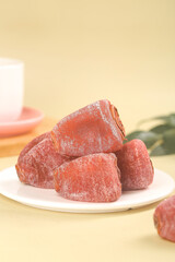 Dried Persimmons on White Plate - Traditional Korean Fruit Snack Food Photography