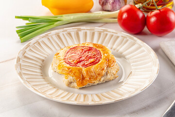 Chicken chop cutlet with cheese and tomato