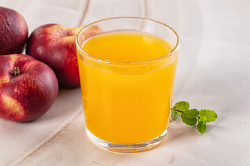 Vitamin beverage - peach juice glass
