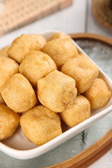 Golden Fried Tofu Cubes in Bowl - Asian Vegetarian Protein Food Ingredient
