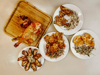 Delicious meat kebab with fresh vegetable salad served with variety of Turkish dishes and appetizers. Top view of assorted Turkish food and meze, tasty and healthy Mediterranean cuisine. Top view.