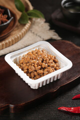 Japanese Natto Fermented Soybeans in Container on Wooden Board - Traditional Asian Health Food