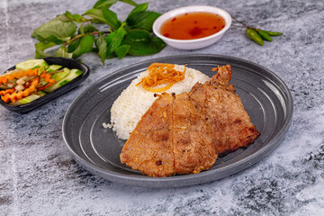 Roasted pork steak with rice